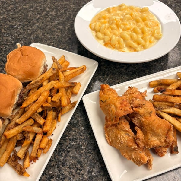 Annamarie's on Main sliders and fries, chicken tenders and fries, and a bowl of macaroni and cheese.