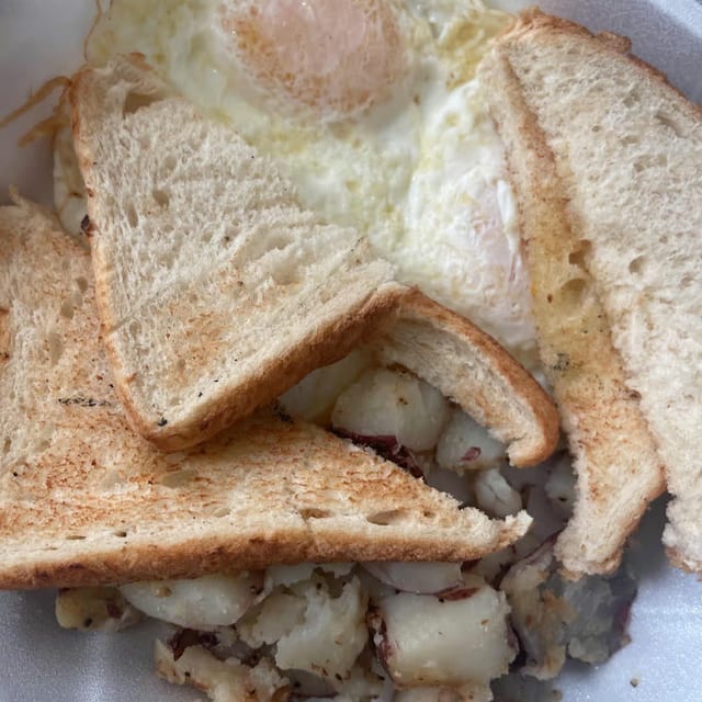 2 Eggs, Homefries & Choice of Toast.