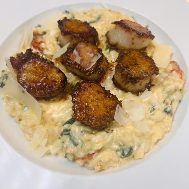 Parm Crusted Scallops Over Risotto.
